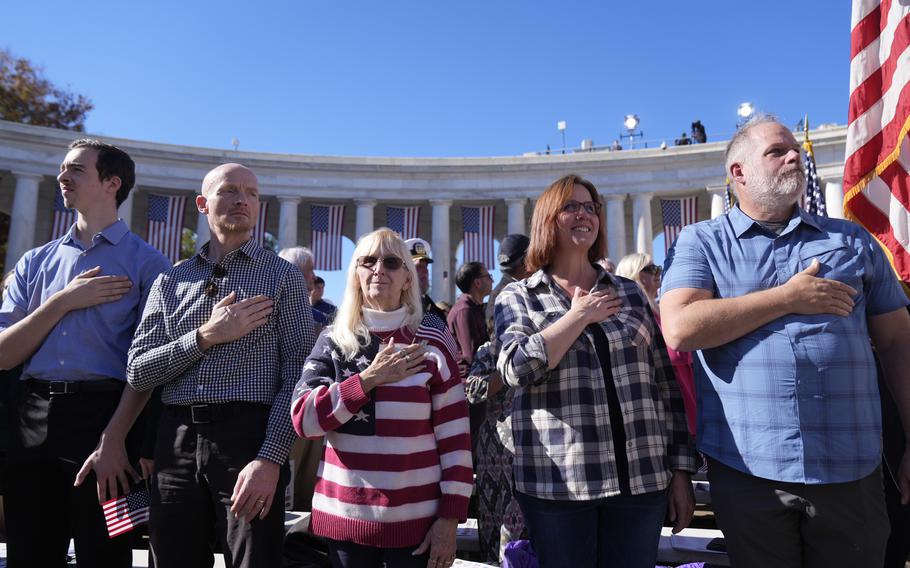 Attendees look on during the Presentation of the Colors 