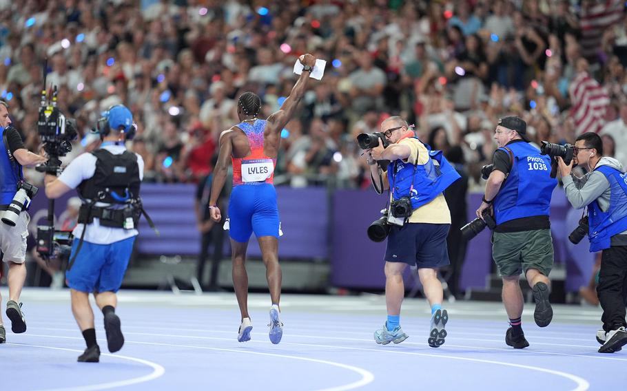 After winning the remarkable race, Lyles embodied the spirit of an Olympic champion sprinter. 