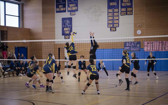 The Ansbach Cougars spike a ball to the Hohenfels Tigers in their final game of the day during a volleyball tournament in Ansbach on Oct. 26, 2024.