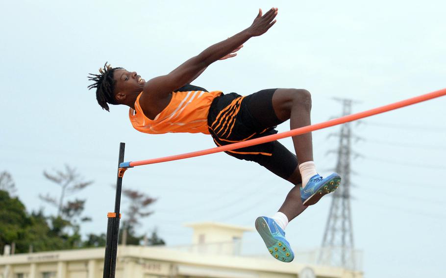 Kadena's Jayden Allen navigates 5 feet, 11 inches in his first high jump competition for Kadena during Friday's first day of a two-day track and field meet. Allen won the event.