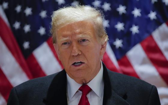 Former President Donald Trump speaks during a press conference at 40 Wall Street after a pre-trial hearing at Manhattan criminal court, Monday, March 25, 2024, in New York. A New York judge has scheduled an April 15 trial date in former President Donald Trump's hush money case. Judge Juan M. Merchan made the ruling Monday.(AP Photo/Frank Franklin II)