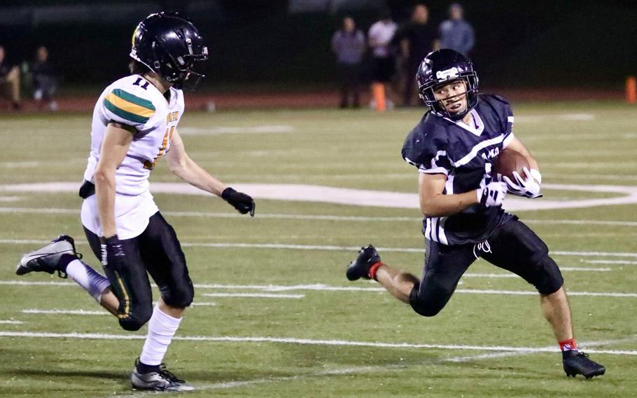 Isaiah Segara runs with the ball.