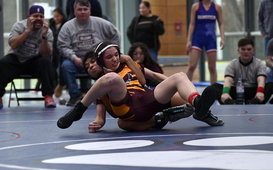 Ileana Rodriguez pulls Daria Echeverria to the mat.