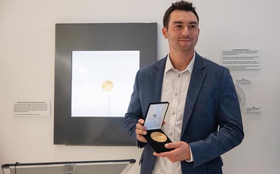 Kyle Higashioka, a catcher for the San Diego Padres, received a replica of a Congressional Gold Medal on Monday.
