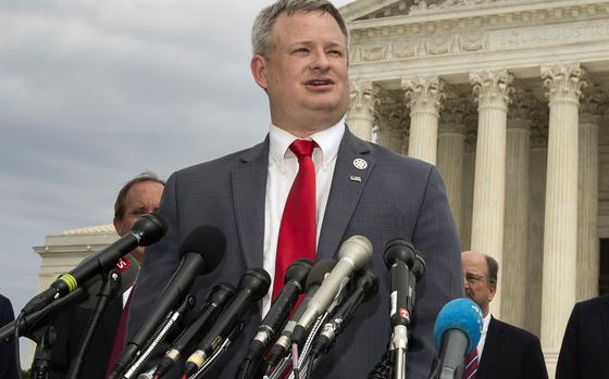 FILE -  South Dakota Attorney General Jason Ravnsborg speaks to reporters in front of the U.S. Supreme Court in Washington on Sept. 9, 2019. (AP Photo/Manuel Balce Ceneta, File)