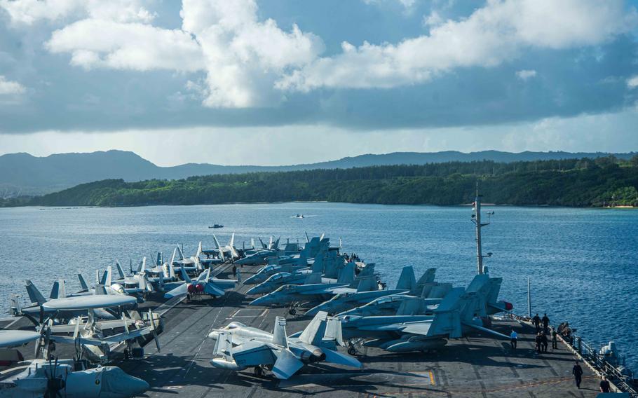 The USS Ronald Reagan steams into Apra Harbor, Guam, for a scheduled port visit on June 19, 2024. 