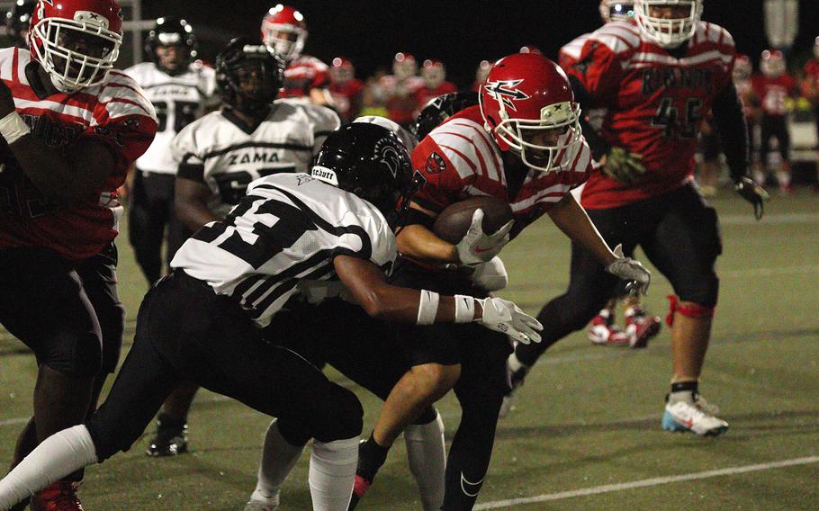 Nile C. Kinnick's Derek Ulrich rushed for a 62-yard touchdown against the Trojans.