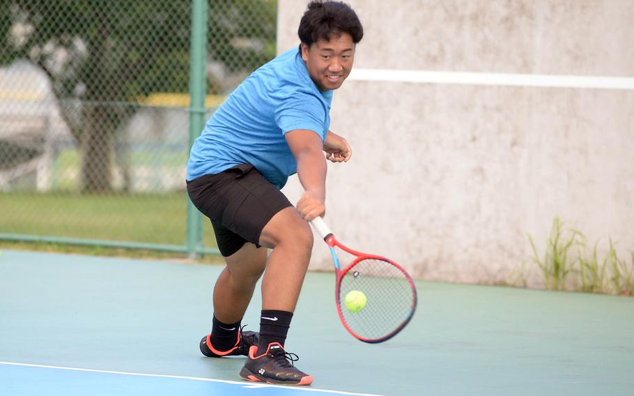 Neo Purificacion is one of four returning boys players to E.J. King's tennis team.