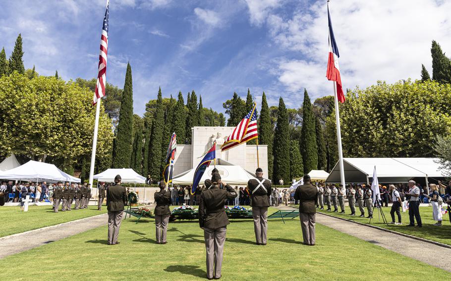 U.S. soldiers play Taps during an anniversary memorial at the Rhone American Cemetery in Draguignan, France, on Aug. 16, 2024. 