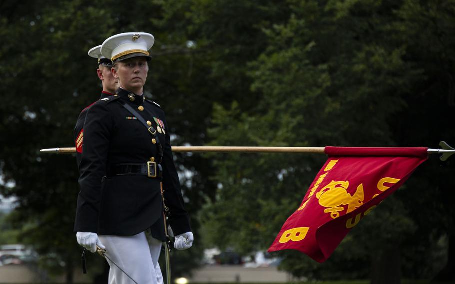 Captain Caroline C. Fender, Company Commander, Bravo Company, Marine Barracks Washington, executes “Pass in Review” during a Sunset Parade at the Marine Corps War Memorial, Arlington, Va., July 23, 2024. 