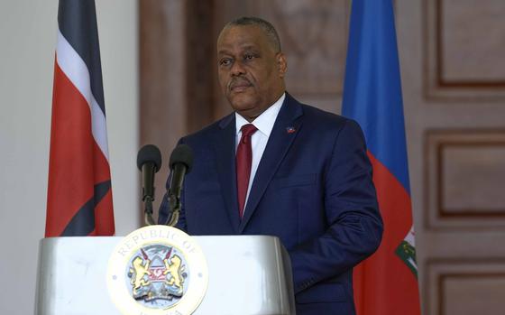 FILE - Haiti Prime Minister Garry Conille speaks during a joint press conference with Kenya's President William Ruto at the State House in Nairobi, Kenya, Oct. 11, 2024. (AP Photo/Brian Inganga, File)