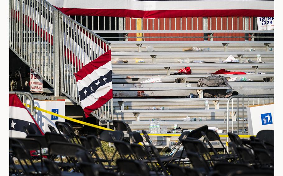 Belongings left behind by attendees and blood on the seating after a rally in Butler, Pa., on July 13, 2024, following the assassination attempt on former president Donald Trump.