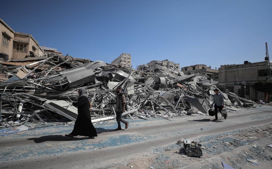 Palestinian families evacuate their homes Oc. 13, 2023, after the Israeli military warned that more than 1 million people in northern Gaza should evacuate south within 24 hours.