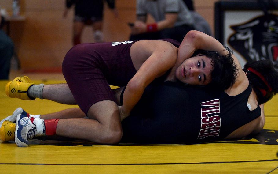 Sean-Carlos Fuentes tries to get his head free.