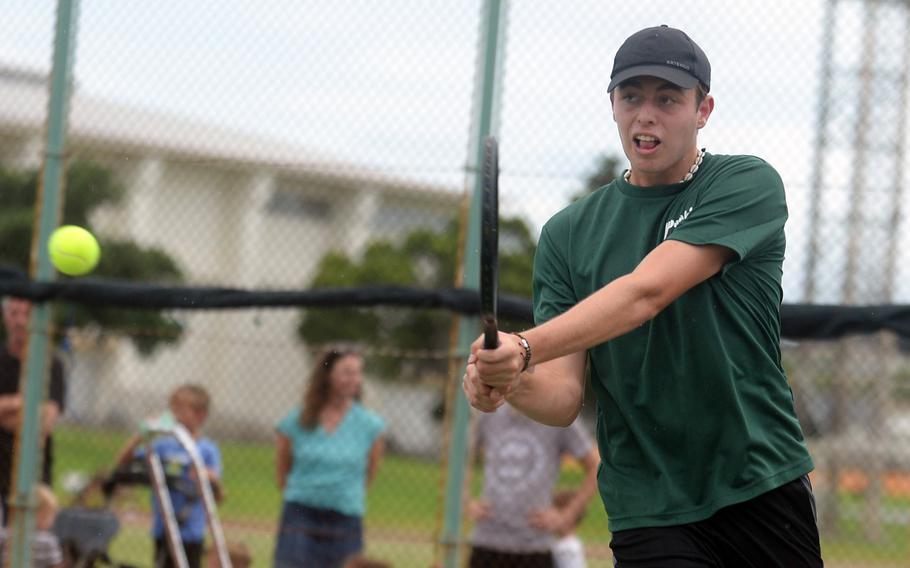 Senior Jacy Fisk successfully defended his Okinawa island boys doubles and mixed-doubles titles.