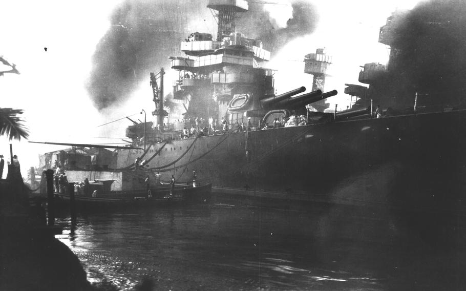 Lines from the USS Tennessee are attached to mooring quay F-6-N in Pearl Harbor, Hawaii, in this photo taken on Dec. 7, 1941.