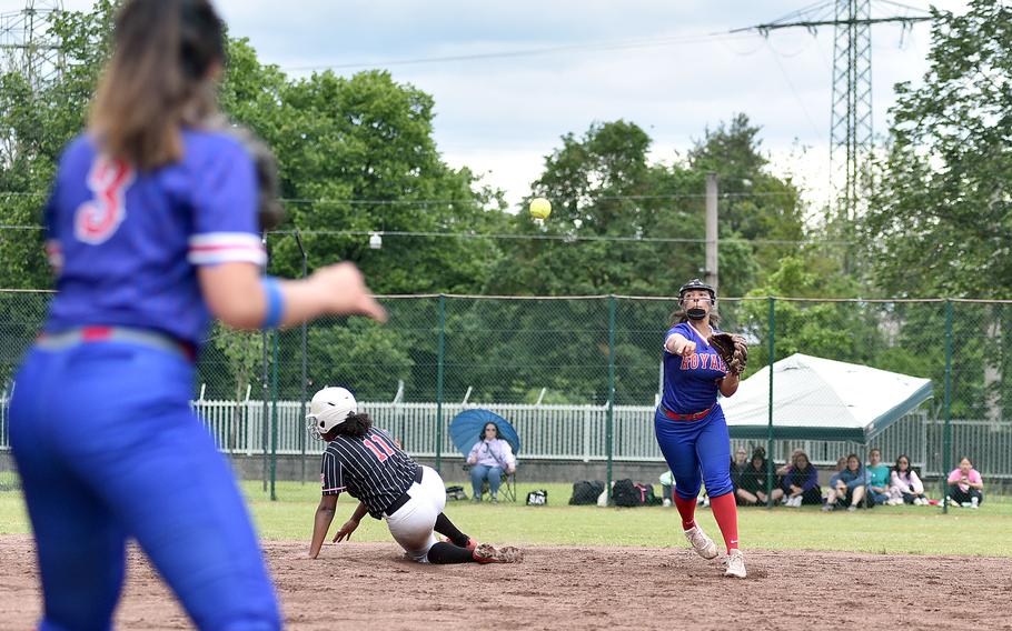 Ramstein shortstop Ania Edwards throws the ball to first base and getting the force out of Kaiserslautern's Selam Foery at second base during the Division I DODEA European softball championship game on May 24, 2024, at Kaiserslautern High School in Kaiserslautern, Germany.