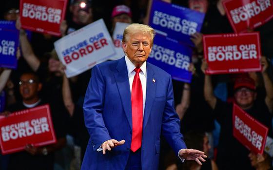 Former US President and Republican presidential candidate Donald Trump dances during a campaign rally at Findlay Toyota Arena in Prescott Valley, Arizona, on Oct. 13, 2024. (Caitlin O'Hara/AFP/Getty Images/TNS)