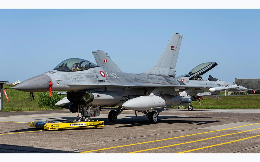 A Danish F-16 fighter jet is pictured at the Fighter Wing Skrydstrup Air Base near Vojens, Denmark on May 25, 2023. 