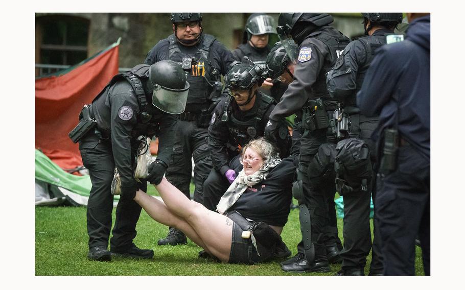 Police arrest a protester on the University of Pennsylvania campus in Philadelphia on May 10, 2024. 