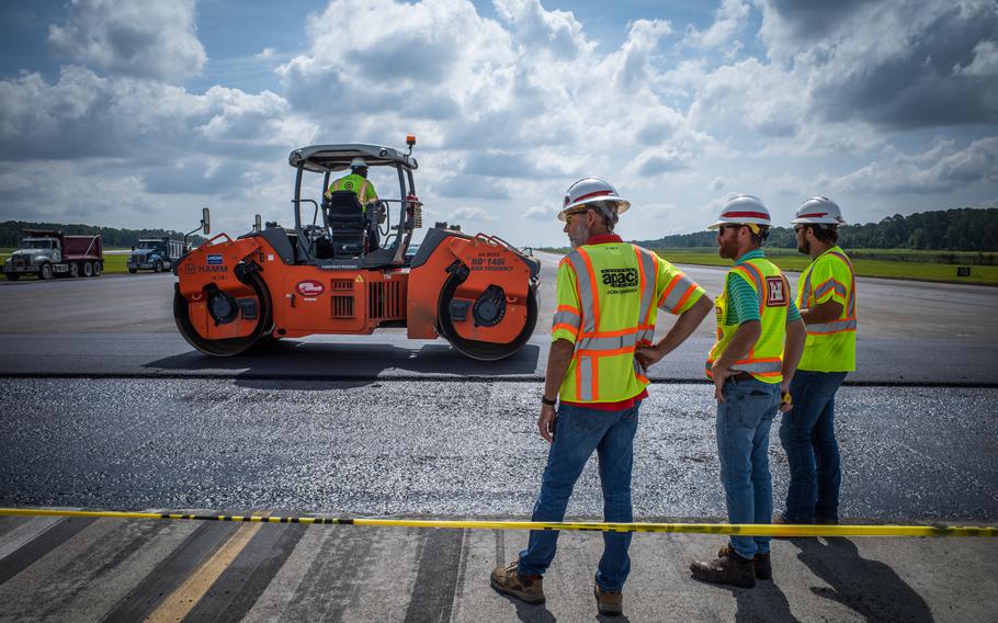Matthew Hoyle (middle), U.S. Army Corps of Engineers materials engineer, oversees asphalt placement at Hunter Army Airfield, June 2, 2023. The Army Corps of Engineers has begun repaving the runway at Hunter Army Airfield in Georgia, with completion expected by July 31.