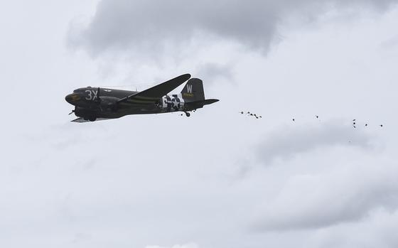 A Douglas C-47 Skytrain drops candy parachutes during the Berlin Airlift 75th anniversary commemoration on June 16, 2024, in Wiesbaden, Germany. The candy drop paid tribute to "Candy Bomber" Col. Gail Halverson and "Operation Little Vittles.”  