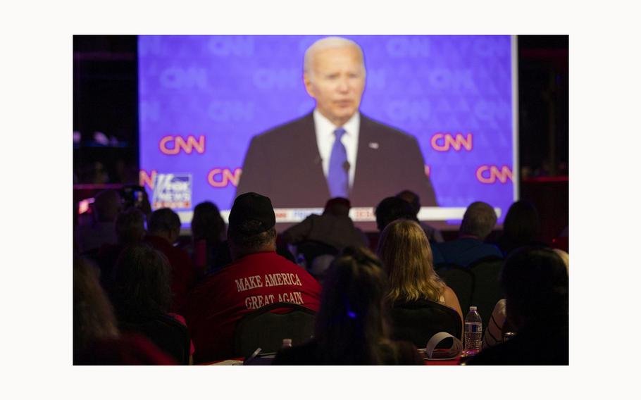 People in Smyrna, Ga., watch the presidential debate on Thursday, June 27, 2024.