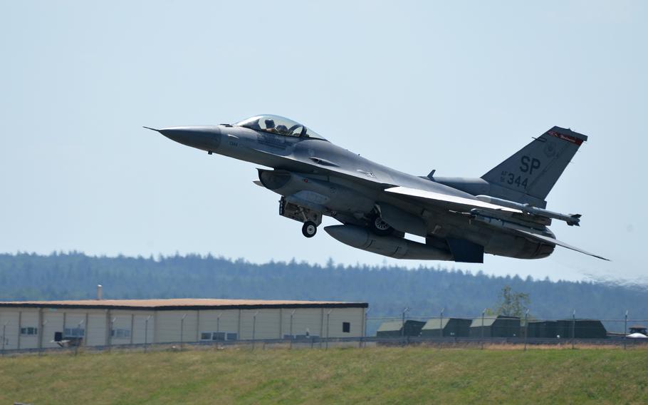 A 52nd Fighter Wing F-16 takes off from Spangdahlem Air Base, Germany, in June 2023. An F-16 from the wing declared an in-flight emergency Sept. 19, 2024, requiring the pilot to jettison two empty fuel tanks about 7 miles from the base. The jet landed safely, and a recovery operation for the tanks is underway.