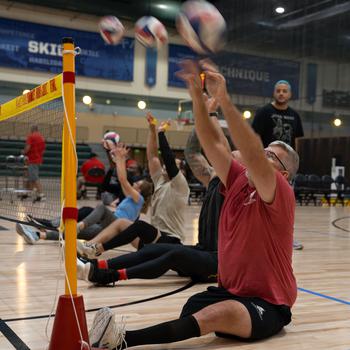 U.S. Army veteran Christopher Parks participates in sitting volleyball practice during the 2024 Department of Defense Warrior Games at the ESPN Wide World of Sports Complex in Orlando, Fla., June 20, 2024. 