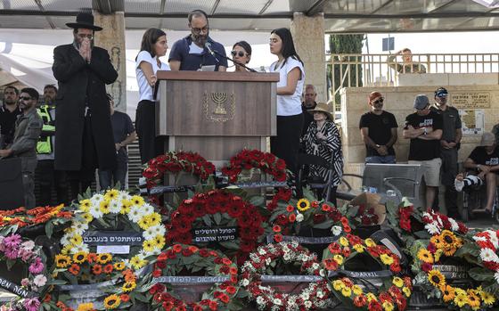 The family of Hersh Goldberg-Polin, parents Jonathan Polin and Rachel Goldberg and sisters Orly and Leebie, speak during his funeral in Jerusalem on Sept. 2, 2024.