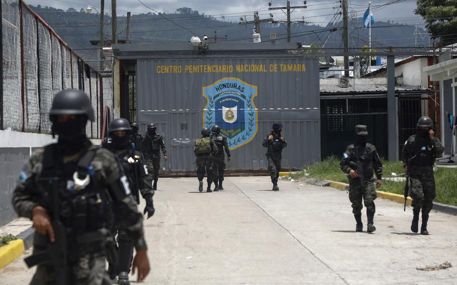 Military police guard the entrance to the National Penitentiary Center