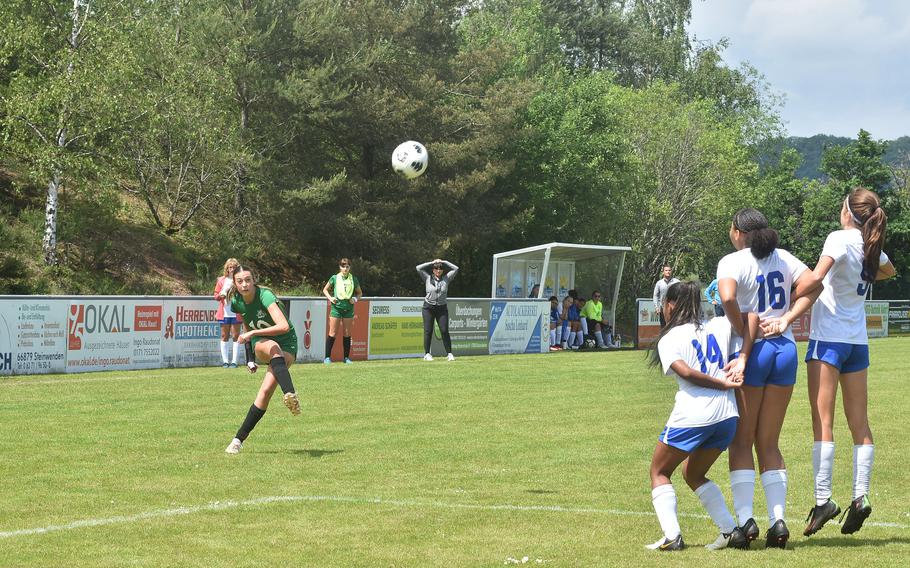 Naples' Emerson Shorey tries to score over a wall of Rota defenders with a free kick Wednesday, May 22, 2024, at the DODEA European Division II girls soccer championships at Reichenbach-Steegen, Germany.