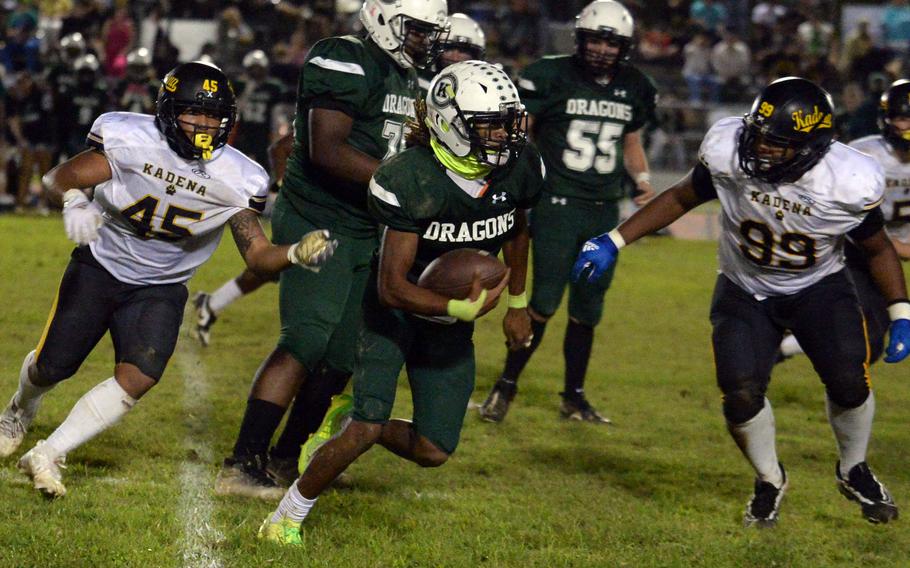 Carlos Cadet runs with the ball.