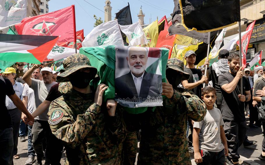 Members of the Palestinian Joint Action Committee hold a rally and symbolic funeral for late Hamas leader Ismail Haniyeh in Beirut on Aug. 2, 2024.