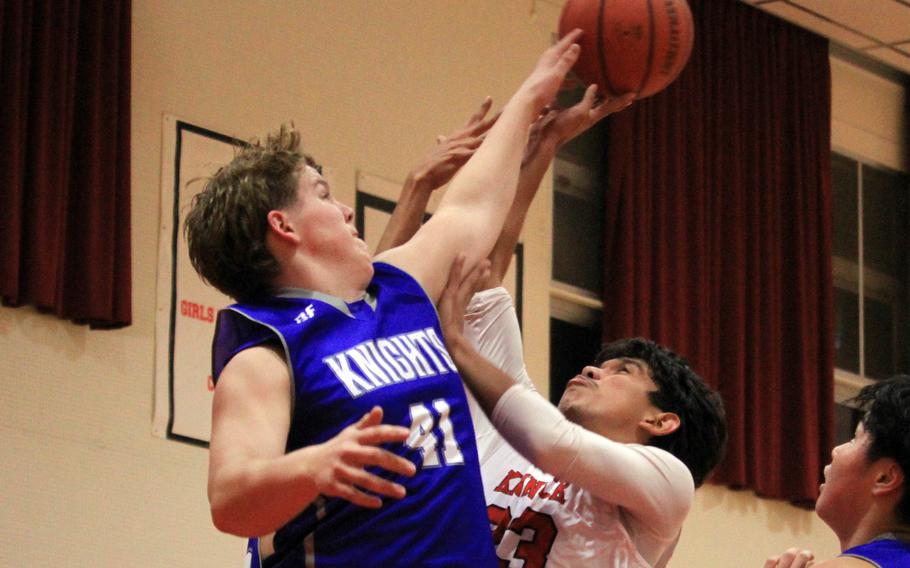 Lewis Hershberger tries to block a shot.