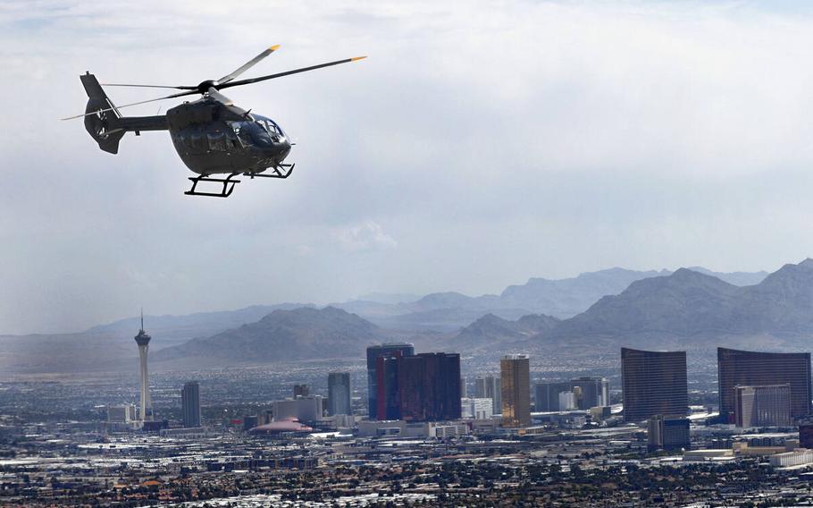 A UH-72B Lakota helicopter that belongs to the Nevada Army Guard flies over the Las Vegas Strip, Tuesday, May 16, 2023. 