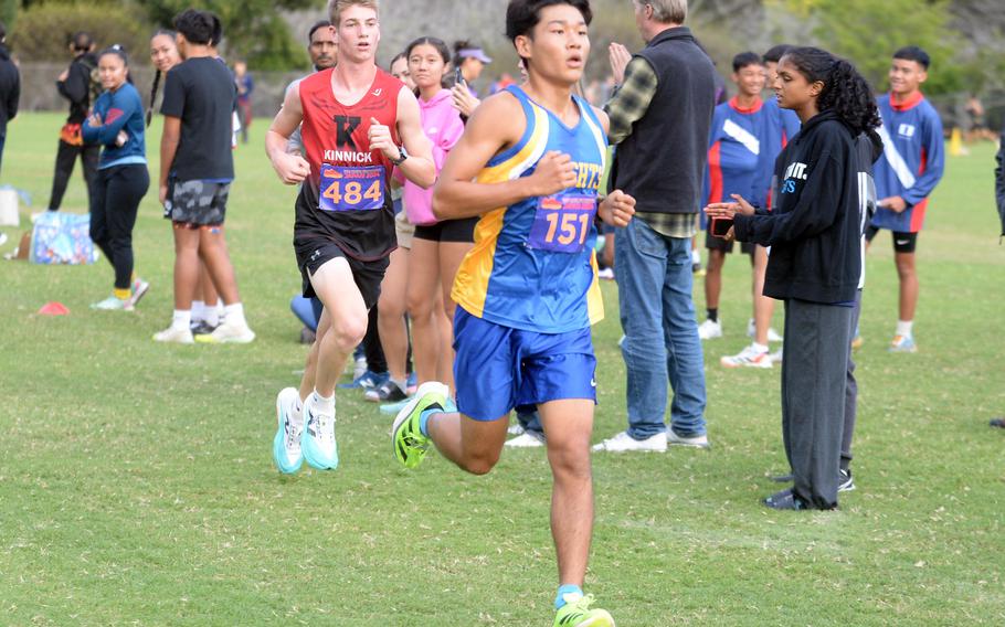 Simon Nakamura and Talan Farrington battle it out.