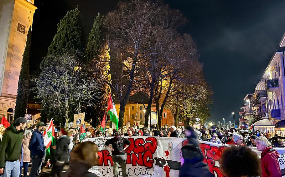 Pro-Palestinian demonstrators march near the home of U.S. Army Garrison Italy.