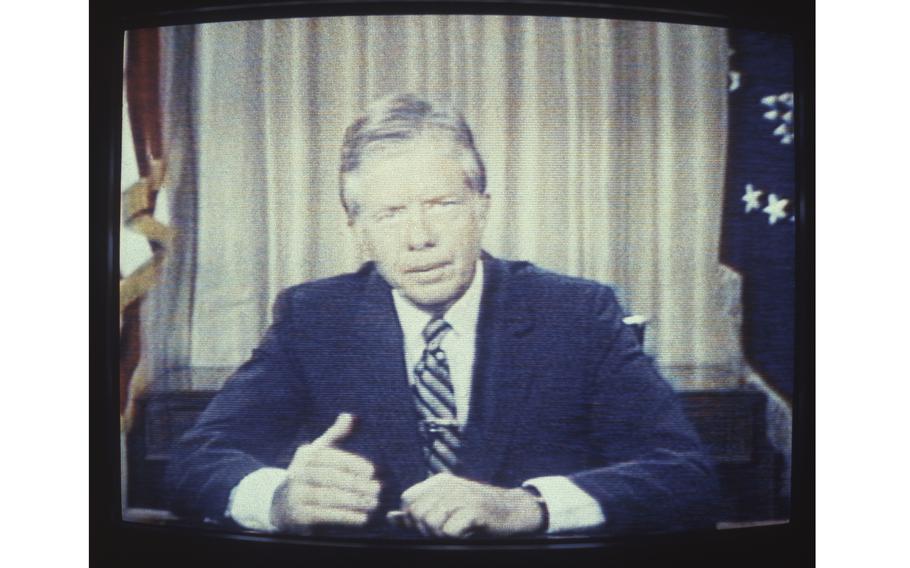 Jimmy Carter speaks on television.