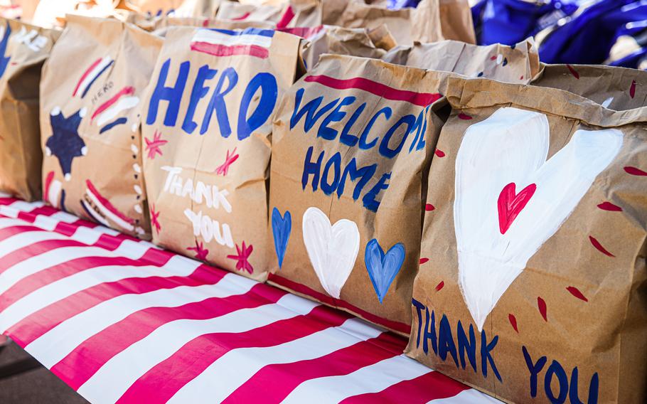 Families of U.S. Marines assigned to the 15th Marine Expeditionary Unit decorate and distribute gifts for Marines at Marine Corps Base Camp Pendleton, Calif., on Aug. 10, 2024. 