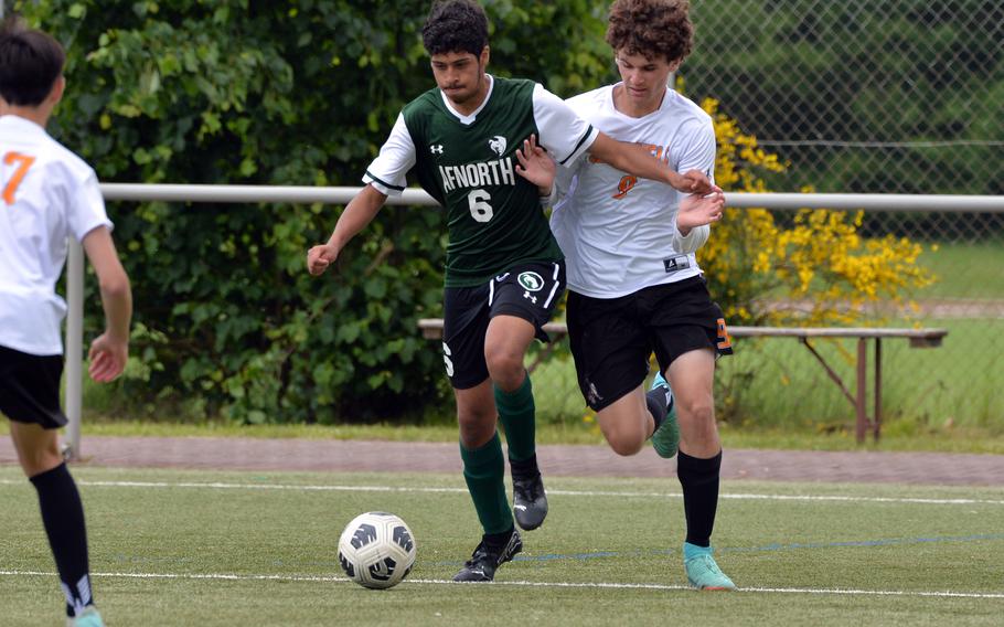 AFNORTH’s Jens Muller and Spangdahlem’s Malachi Taherimorvat fight for the ball in a Division III semifinal at the DODEA-Europe soccer finals in Landstuhl, Germany, May 22, 2024. AFNORTH won 4-0 to advance to Thursday’s final against Ansbach.