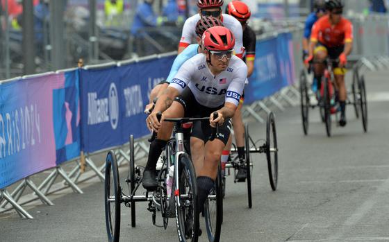 Dennis Connors of the United States leads the pack at the start of the men's T1-2 para cycle road race at the 2024 Paris Paralympics Sept. 7, 2024 in Clichy-sous-Bois, France.