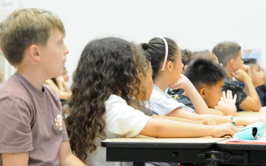 Students listen to opening remarks during a first-day-class ceremony at Killin Elementary School on Camp Foster, Okinawa, Monday, Aug. 19, 2024. 