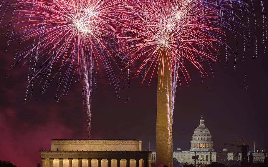 Fireworks burst above the National Mall, Lincoln Memorial, Washington Monument and U.S. Capitol building during Independence Day celebrations in Washington.
