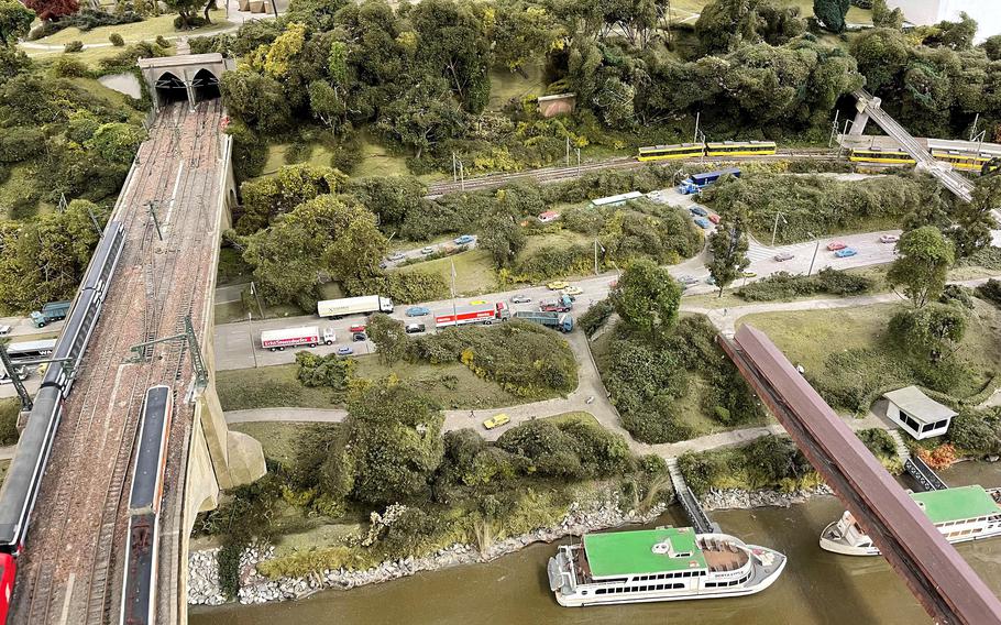 A miniature model of Stuttgart with bridges crossing the river.