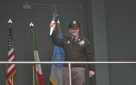 Col. Stephen Skells cuts a ribbon, officially opening Caserma Matteo Miotto for the 207th Military Inteligence Brigade on Jan. 24, 2025.