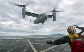 An MV-22B Osprey lands abaord the amphibious transport dock ship USS New Orleans during Keen Sword drills in the Philippine Sea, Nov. 18, 2022.