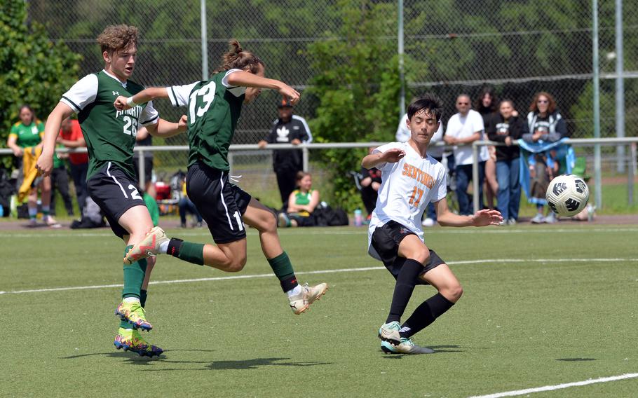 AFNORTH’s Juan Antonio Ray beats teammate Santiago Aconite to a ricocheted ball to score a Lions’  goal in their 4-0 win over Spangdahlem in a Division III semifinal at the DODEA-Europe soccer finals in Landstuhl, Germany, May 22, 2024. Spangdahlem’s James Idems tries to defend.