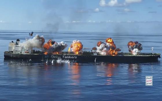 This frame grab from video released by the Ansar Allah Media Office, the media arm of Yemen's Houthi rebels, on Thursday, Aug. 29, 2024, shows explosions striking the Greek-flagged oil tanker Sounion in the Red Sea after Yemen's Houthi rebels boarded and set explosives on the  tanker, which was earlier abandoned after the Houthis repeatedly attacked it, setting off blasts that put the Red Sea at risk of a major oil spill. The logo in the bottom righthand corner of the image reads in Arabic: "Yemeni War Media." (Ansar Allah Media Office via AP)