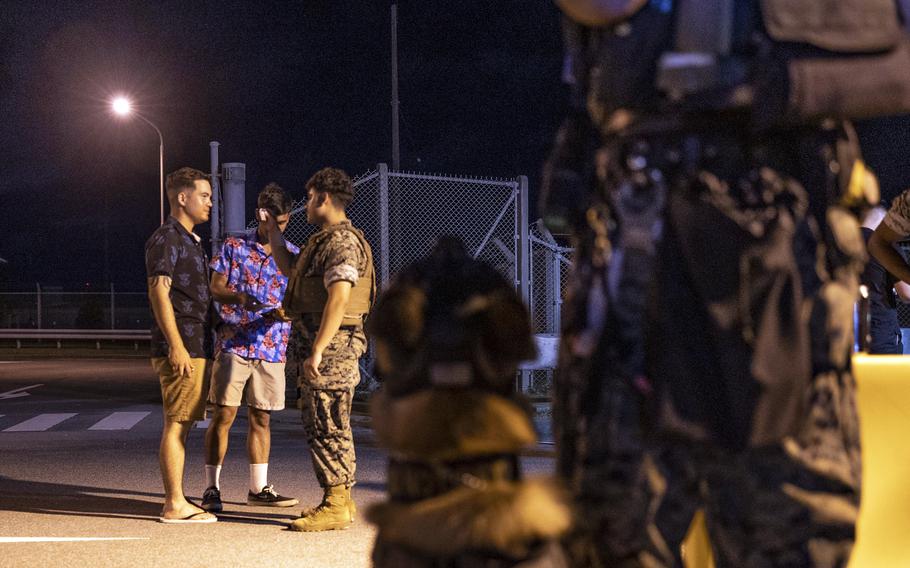 Marines with III Marine Expeditionary Force and Marine Corps Installations Pacific verify liberty documents at Camp Hansen, Okinawa, July 19, 2024.